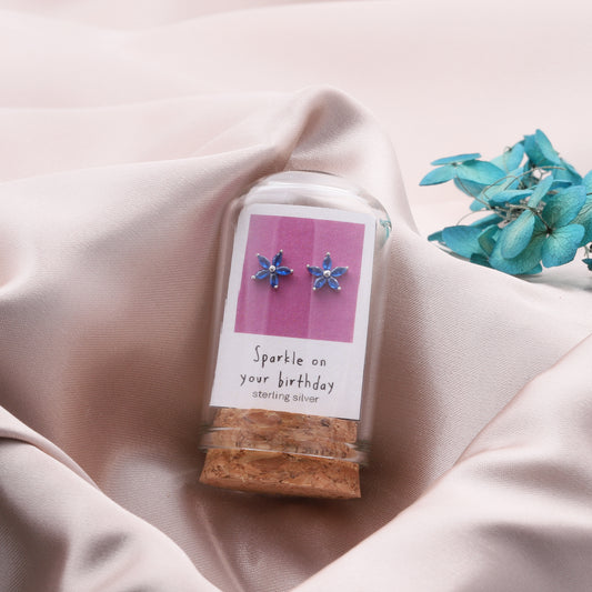 TT50127/128 'Sparkle on your birthday' BLUE gem flower earrings S/G