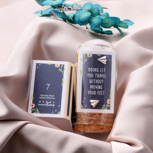 TT8407 BOOKS LET YOU TRAVEL Paper Plane earrings