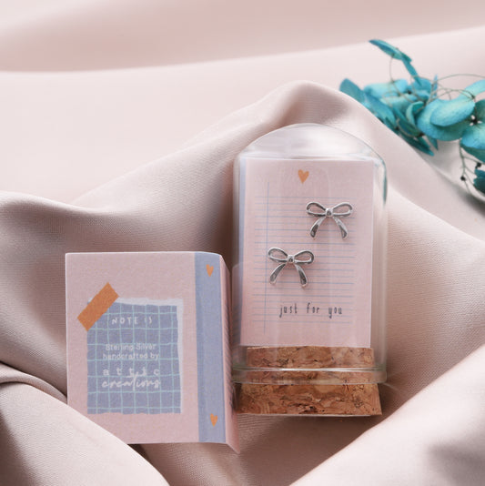 TT57023 LITTLE NOTE little bow earrings SILVER