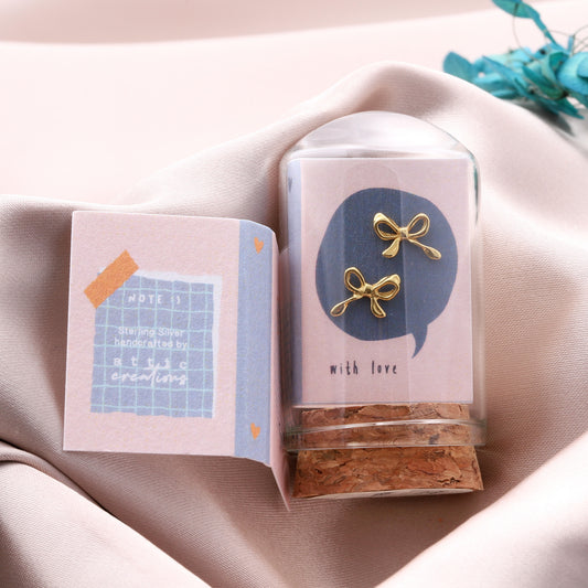 TT57068 LITTLE NOTE Curled bow earrings GOLD