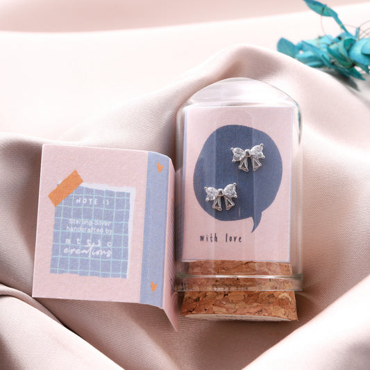 TT57061 LITTLE NOTE Crystal bow earrings