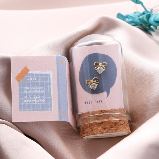 TT57064 LITTLE NOTE Bow and crystal heart earrings GOLD