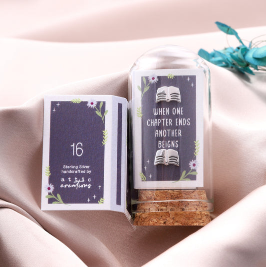 TT8416 "WHEN ONE CHAPTER ENDS" Open book earrings
