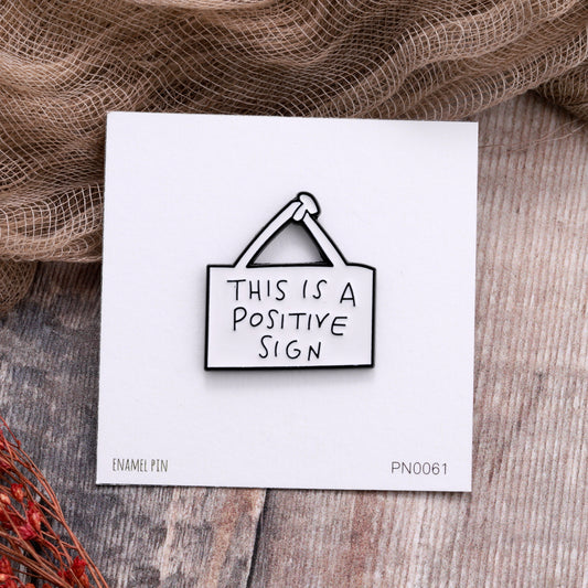 PN0061 This is a positive sign Enamel Pin