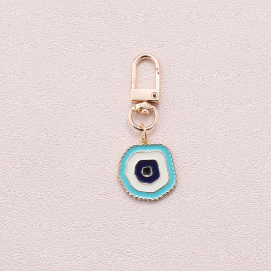K016 Asymetrical Evil eye Blue enamel keyring
