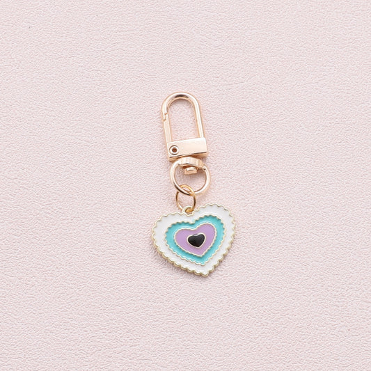 K043 Evil eye purple green heart enamel keyring