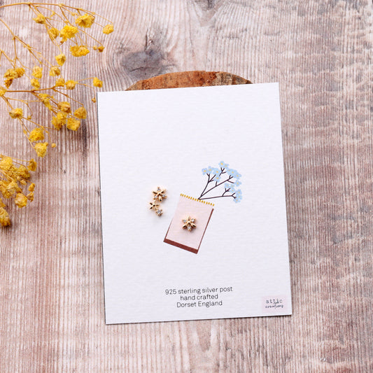 ME008 Asymmetric flower earrings