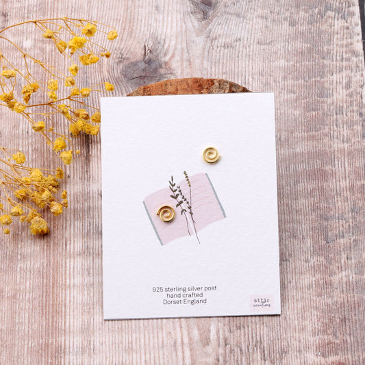 ME010 Gold swirl earrings