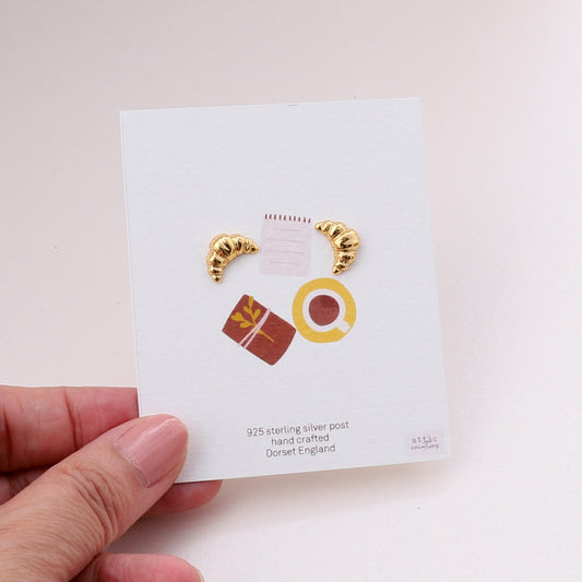 ME218 Gold croissant earrings