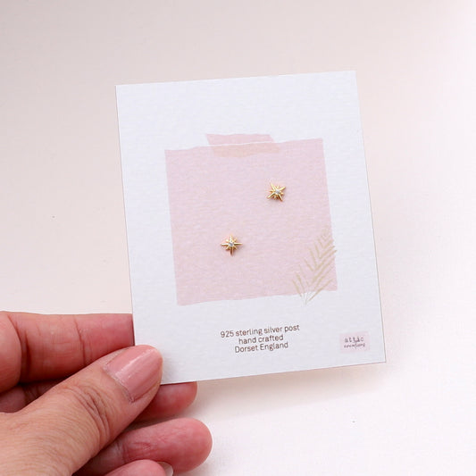 ME214 Gold little sparkle star earrings