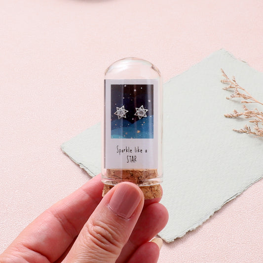 TT60059 'Sparkle like a star' crystal six point star earrings in a bottle