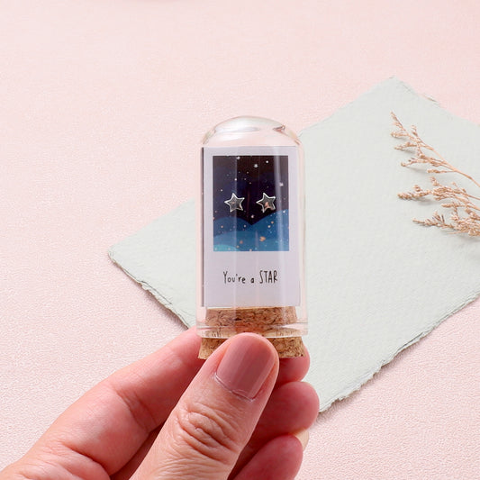 TT60048 You are a star..mini star earrings in a bottle silver
