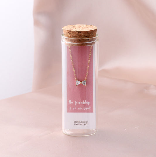 ST9038 NO FRIENDSHIP IS AN ACCIDENT Crystal bow necklace