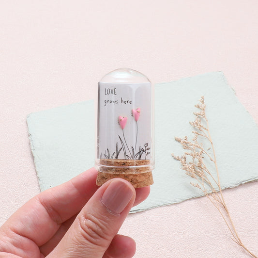 TT51240 LOVE GROWS HERE Enamel pink heart earrings with a star