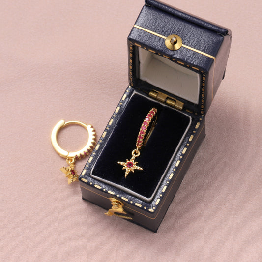 MEH005 North star ear hoop with red gem